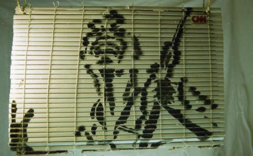 african soldier on a Window blind